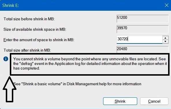 Disk Management Shrink dialog showing the warning about unmovable files and a reference to the defrag event in the Application log.