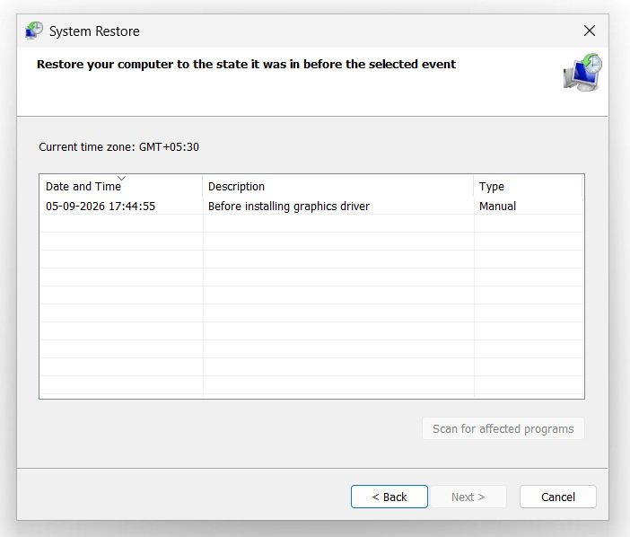 Windows 11 System Restore wizard showing restore point selection list