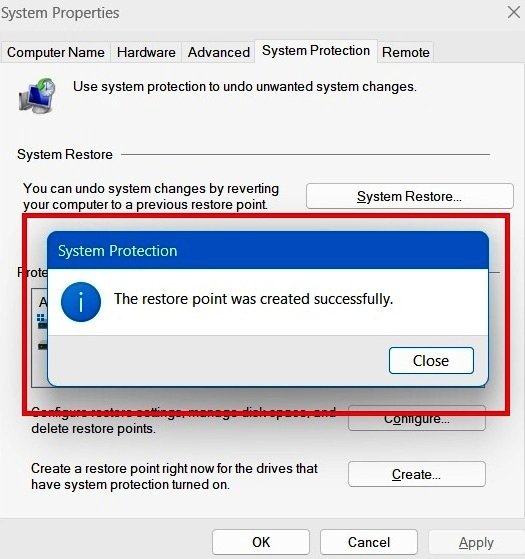 Confirmation message in Windows 11 confirming a restore point was created successfully